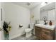 Stylish half bathroom featuring modern vanity, fixtures, and elegant decorative touches at 11011 N 92Nd St # 1005, Scottsdale, AZ 85260