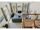 Spacious living room with a fireplace, large windows and high ceilings providing ample natural light at 11011 N 92Nd St # 1005, Scottsdale, AZ 85260
