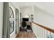 Cozy home office space with natural light and a functional work area at 11011 N 92Nd St # 1005, Scottsdale, AZ 85260