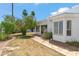 White backyard featuring desert landscaping with desert landscaping at 113 E Boca Raton Rd, Phoenix, AZ 85022