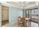 Cozy dining area featuring a wooden table set and access to the patio at 113 E Boca Raton Rd, Phoenix, AZ 85022