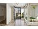 Foyer entrance with tile flooring, open access to the living room and ample natural light at 113 E Boca Raton Rd, Phoenix, AZ 85022