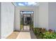 Eye-catching entry gate and serene front garden with beautiful desert landscaping at 113 E Boca Raton Rd, Phoenix, AZ 85022