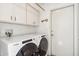 A laundry room with updated washer and dryer at 113 E Boca Raton Rd, Phoenix, AZ 85022