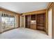 Living room showcasing a large window, built-in shelves, and natural light at 113 E Boca Raton Rd, Phoenix, AZ 85022