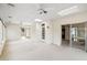 Bright sun room with ceiling fans, skylights, and sliding doors to the backyard at 113 E Boca Raton Rd, Phoenix, AZ 85022