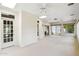 Sun room with ceiling fans, skylights, and sliding doors to the backyard at 113 E Boca Raton Rd, Phoenix, AZ 85022