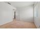 Light-filled bedroom featuring neutral carpet at 11710 W Paradise Dr, El Mirage, AZ 85335