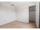 Empty room with neutral carpet at 11710 W Paradise Dr, El Mirage, AZ 85335