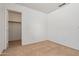 Clean bedroom featuring neutral carpet at 11710 W Paradise Dr, El Mirage, AZ 85335