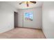 Well-lit bedroom with view to the outside at 11710 W Paradise Dr, El Mirage, AZ 85335