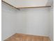 Walk-in closet space with carpeting and shelving for optimal storage at 11710 W Paradise Dr, El Mirage, AZ 85335