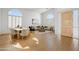 Bright living room with high ceilings, wooden floors, arched windows, and a modern design at 11993 E Mission Ln, Scottsdale, AZ 85259