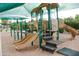 Community playground features slides, stairs, and platforms, providing a fun and safe area for children to play at 11993 E Mission Ln, Scottsdale, AZ 85259