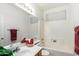 Bright bathroom with a combination bathtub and shower, and a vanity with ample counter space at 12355 W Hadley St, Avondale, AZ 85323