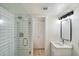 Updated bathroom features walk-in shower and modern vanity and sink at 1351 N Pleasant Dr # 1012, Chandler, AZ 85225