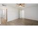 Bright bedroom features hard wood floors, a closet and neutral paint at 1351 N Pleasant Dr # 1012, Chandler, AZ 85225