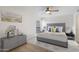 Cozy bedroom with a ceiling fan, calming decor, and a serene atmosphere for relaxation at 1351 N Pleasant Dr # 1012, Chandler, AZ 85225
