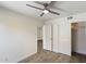 Bright bedroom with hardwood flooring, closet, and neutral paint scheme at 1351 N Pleasant Dr # 1012, Chandler, AZ 85225
