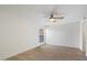 Well-lit bedroom features hardwood flooring and a modern ceiling fan at 1351 N Pleasant Dr # 1012, Chandler, AZ 85225