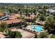 Aerial view of the condo community with mature landscaping and amenities at 1351 N Pleasant Dr # 1012, Chandler, AZ 85225