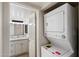 Convenient laundry area with stackable washer and dryer, and updated bathroom at 1351 N Pleasant Dr # 1012, Chandler, AZ 85225