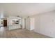 Open-concept living space with a modern kitchen, ample natural light, and stylish flooring at 1351 N Pleasant Dr # 1012, Chandler, AZ 85225
