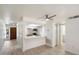 Open-concept living space with a modern kitchen, ample natural light, and stylish flooring at 1351 N Pleasant Dr # 1012, Chandler, AZ 85225