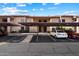 View of the condo's covered parking area with assigned parking spaces at 1351 N Pleasant Dr # 1012, Chandler, AZ 85225