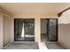 Private outdoor patio with access to the interior through sliding glass doors at 1351 N Pleasant Dr # 1012, Chandler, AZ 85225