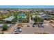 Aerial view of the community pool, splash pad and playground amenities at 14160 W Georgia Dr, Surprise, AZ 85379