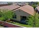 This is an aerial view showing the house top and backyard layout with a covered patio at 14160 W Georgia Dr, Surprise, AZ 85379