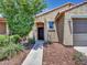 Charming single-Gathering home featuring a neutral-toned facade, low maintenance landscape, and an attached two-car garage at 14160 W Georgia Dr, Surprise, AZ 85379