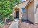 View of home's front entrance, walkway and desert landscaping at 14160 W Georgia Dr, Surprise, AZ 85379