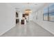Open floor plan featuring tile floors, recessed lighting, and an eat-in kitchen at 14160 W Georgia Dr, Surprise, AZ 85379