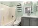 Fresh bathroom with updated vanity, fixtures, and shower-tub combination at 14919 W Hearn Cir, Surprise, AZ 85379