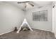Bedroom with neutral paint and plush carpeting at 14919 W Hearn Cir, Surprise, AZ 85379