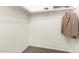 Walk-in closet with clothing racks, shelving and carpeted floor at 14919 W Hearn Cir, Surprise, AZ 85379