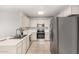 Well-equipped kitchen with stainless steel appliances and ample counter space at 14919 W Hearn Cir, Surprise, AZ 85379