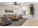 Cozy living room with neutral tones, plush seating, and stylish decor at 14919 W Hearn Cir, Surprise, AZ 85379