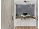 A modern office featuring a desk, comfortable chair, and stylish decor at 16373 W Beautiful Ln, Goodyear, AZ 85338