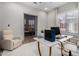 Office featuring a modern desk, comfortable chair, and bright natural light at 16373 W Beautiful Ln, Goodyear, AZ 85338