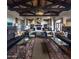 The spacious lobby offers a cozy fireplace, stylish furnishings, and a welcoming atmosphere at 16373 W Beautiful Ln, Goodyear, AZ 85338