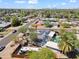 An aerial view shows this home's lush surroundings and neighborhood at 1749 W Monterosa St, Phoenix, AZ 85015