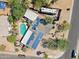 Aerial view of property showing solar panels, pool, and RV parking at 1749 W Monterosa St, Phoenix, AZ 85015
