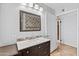 Bathroom with a vanity, mirror, and view into the shower at 1749 W Monterosa St, Phoenix, AZ 85015