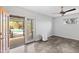 Bedroom with tile floors and direct outdoor access to a covered patio and pool at 1749 W Monterosa St, Phoenix, AZ 85015