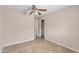 Empty bedroom with tile floors and a closet at 1749 W Monterosa St, Phoenix, AZ 85015
