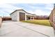 A view of a backyard with garage at 19026 W Becker Ln, Surprise, AZ 85388