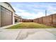 A large backyard with a view of the house at 19026 W Becker Ln, Surprise, AZ 85388